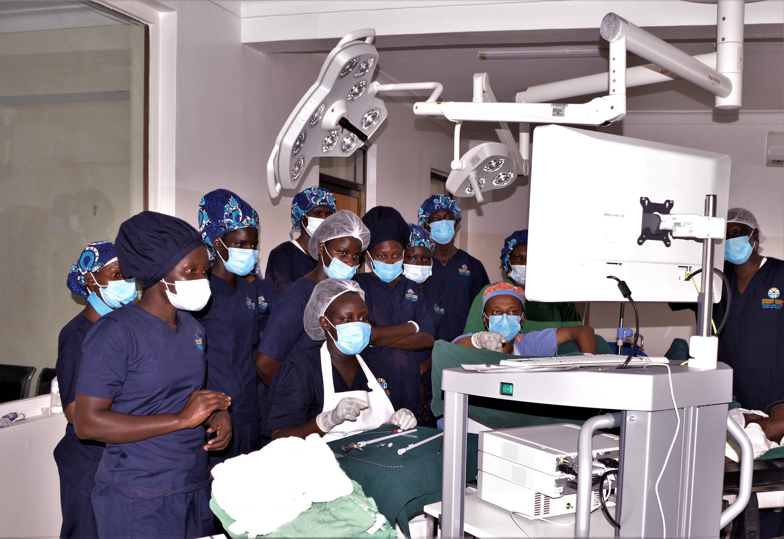 Dr Fekade (Right), trains TWCH staff on the use of the Cystoscope machine insie the the hospital theatre.